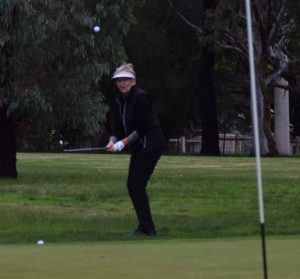 Robyn Baker chips from the fairway