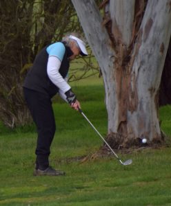 Millie Cumming gets out of the trees during a recent round